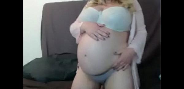  Hot pregnant milf showing her nude body on cam